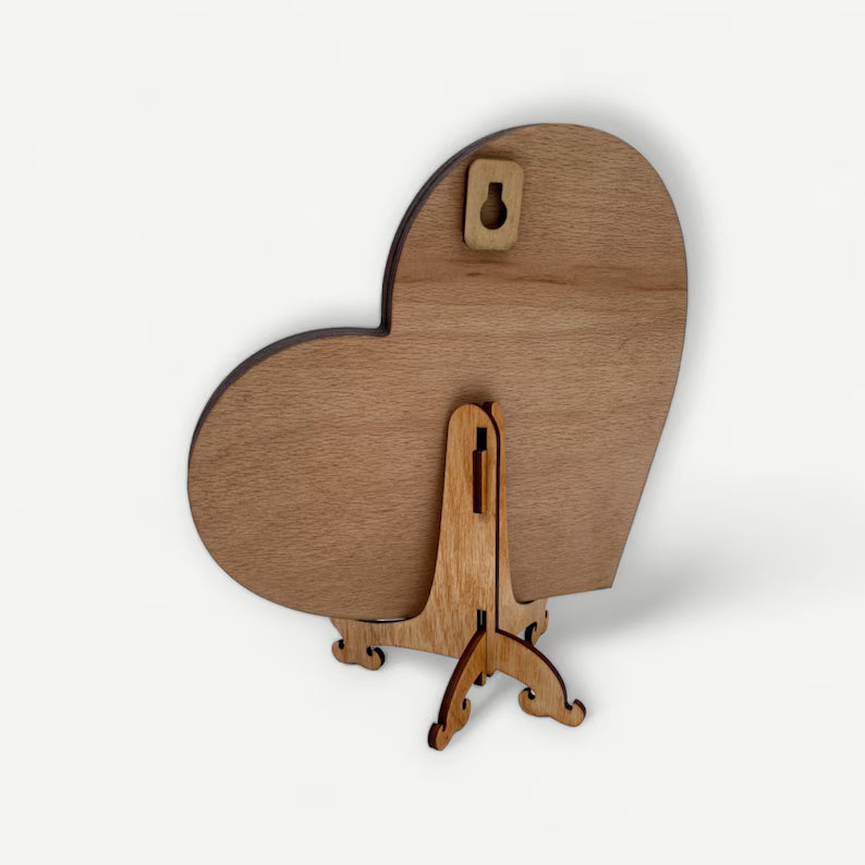 Wooden Heart with Couple on a River Stones